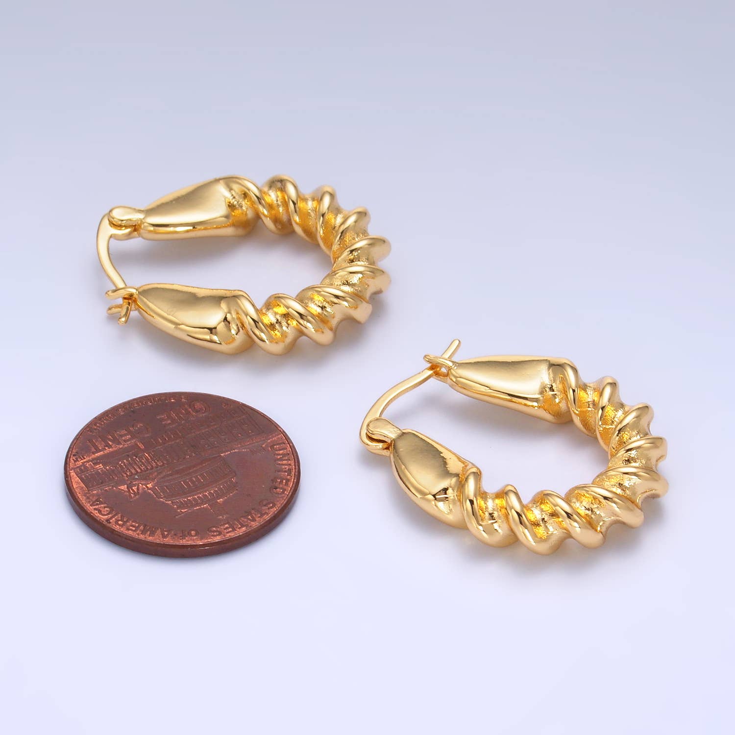 Modern Twisted Gold Hoop Earrings